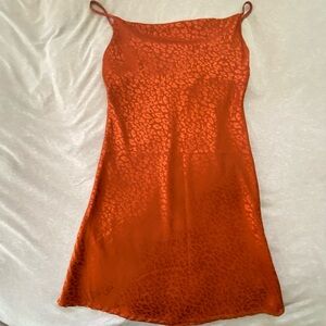Orange animal print mini slip dress